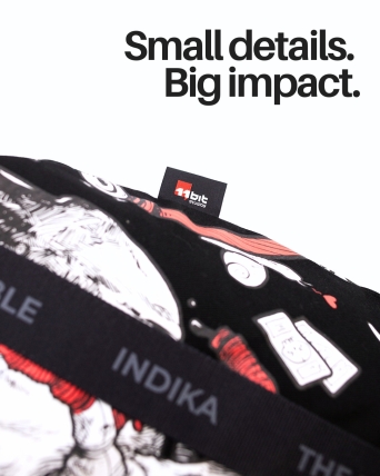 Close-up showing the stitching, printed fabric and branded details of a custom Frostpunk tote bag.